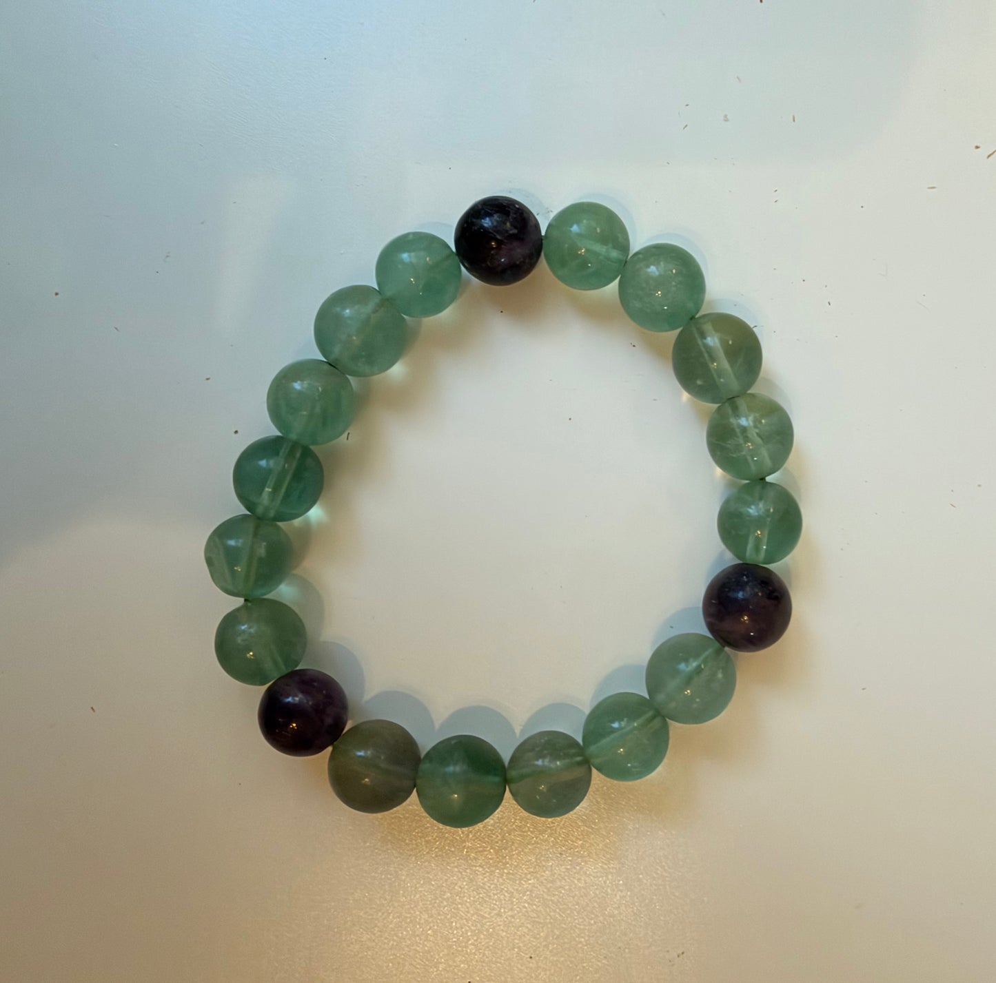 Close view of polished natural fluorite crystal beads