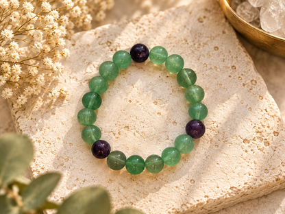 Natural fluorite bead bracelet showing translucent green and violet colour bands