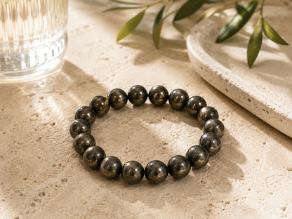 Close-up of natural pyrite crystal bracelet beads