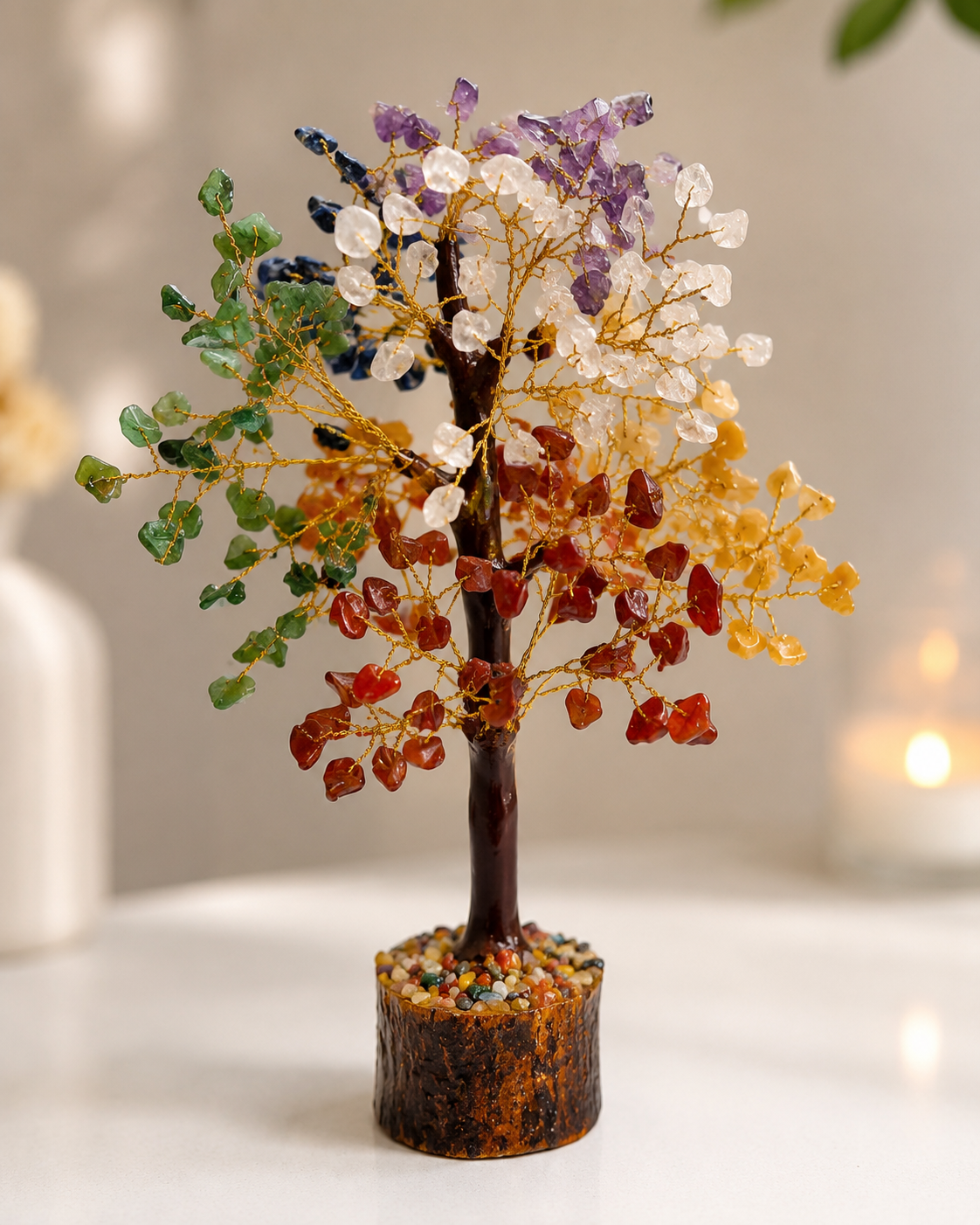 Close-up of Seven Chakra tree gemstone chips in chakra colors