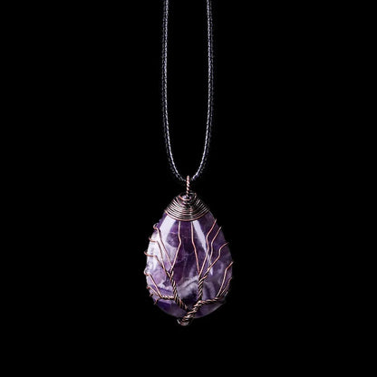Tree of Life pendant necklace in natural purple amethyst, teardrop shape on a black cord
