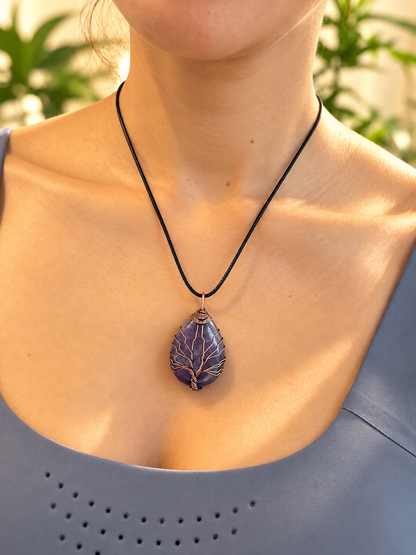 Deep purple amethyst Tree of Life pendant on an adjustable cord