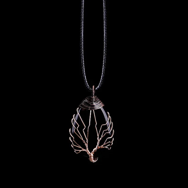Single Tree of Life gemstone pendant necklace on a cord, showing the copper-toned wire tree wrapped over the stone