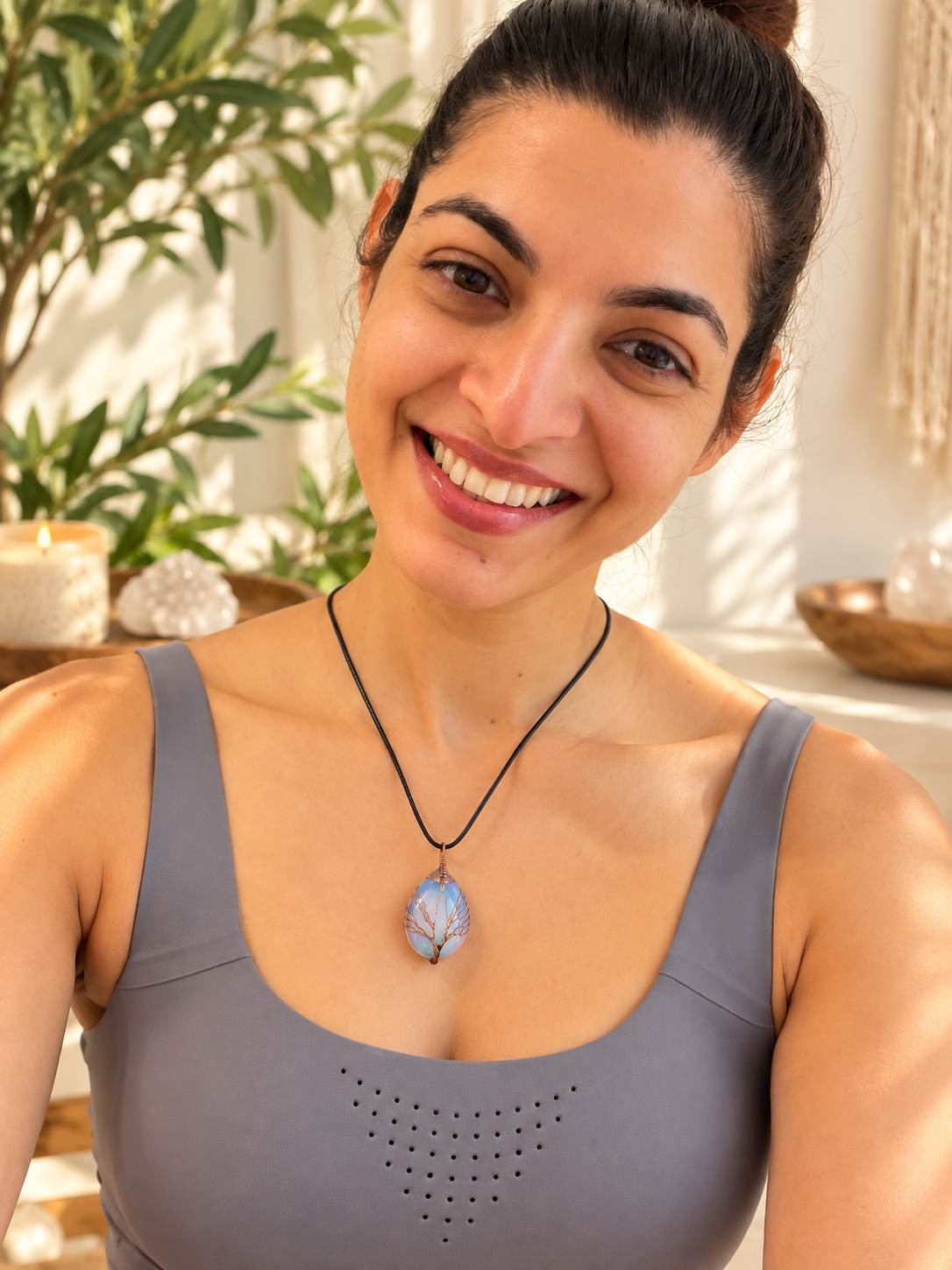 Milky blue opal Tree of Life pendant on an adjustable cord